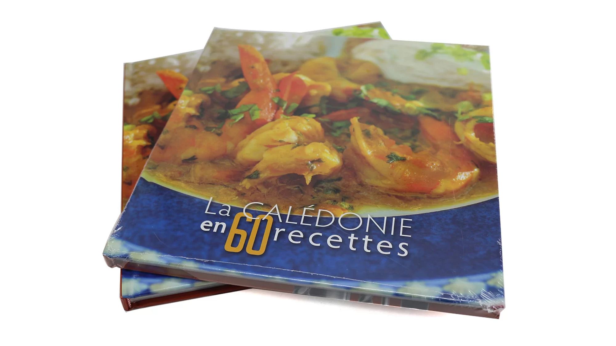 2 plastic sealed recipe books