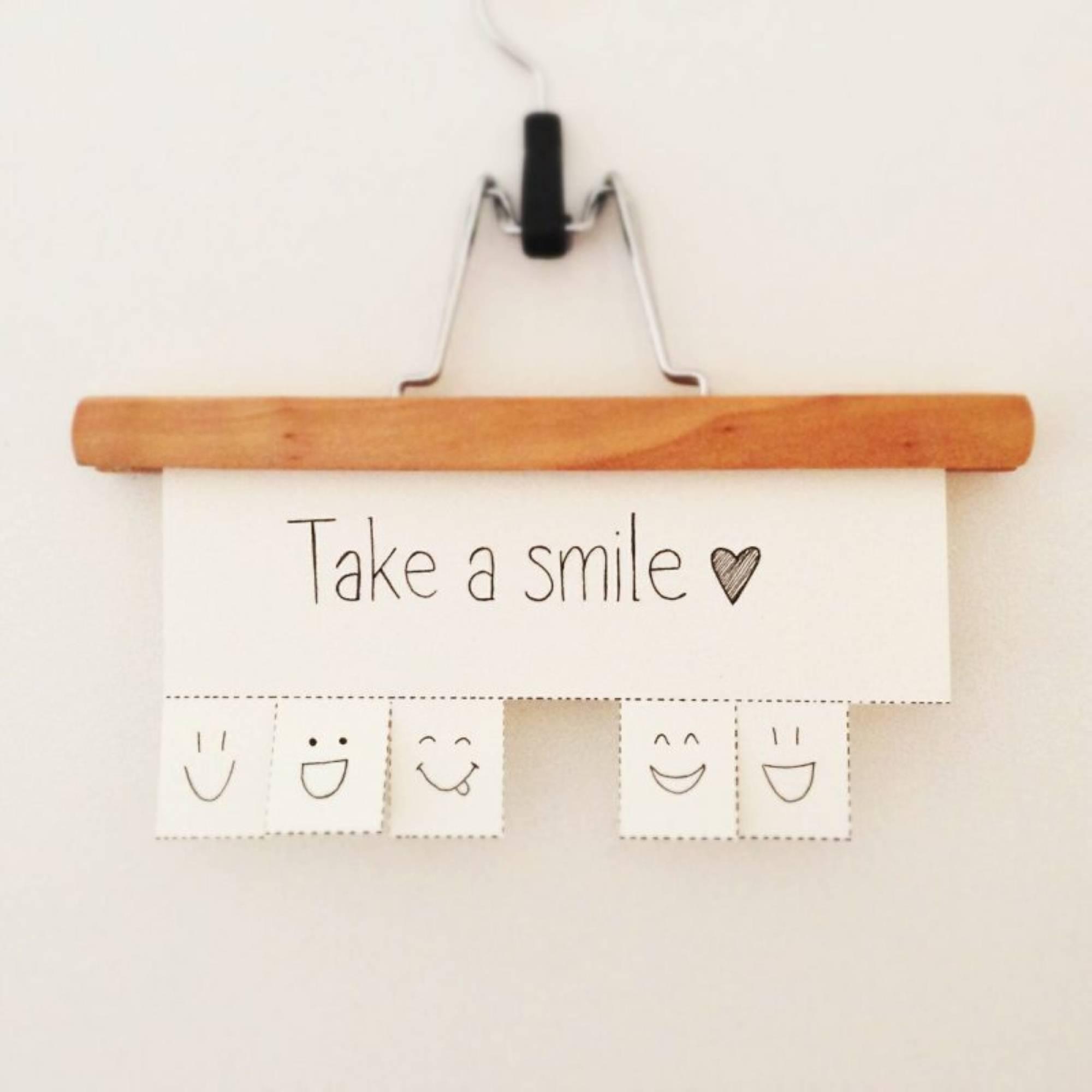 Take a smile tear away poster